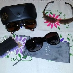 Three pair of Sunglasses together